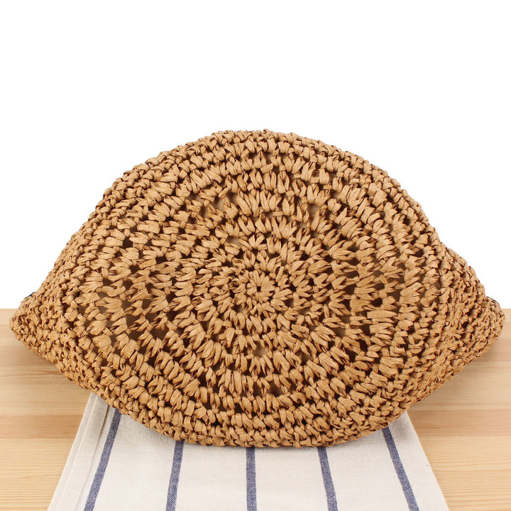 Beach shoulder bag made of handwoven natural material with comfortable carrying handles Bowlift