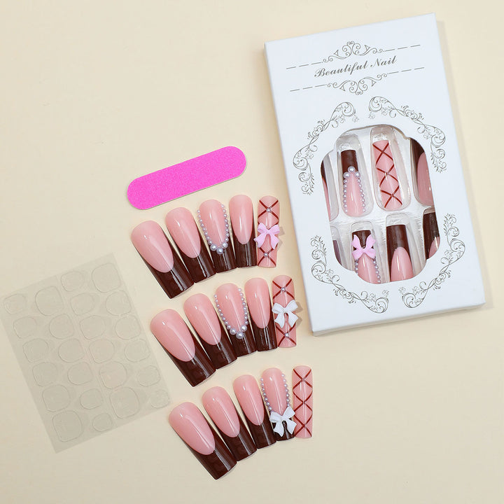 Creative nail art set with stylish bow and glitter accents Bowlift