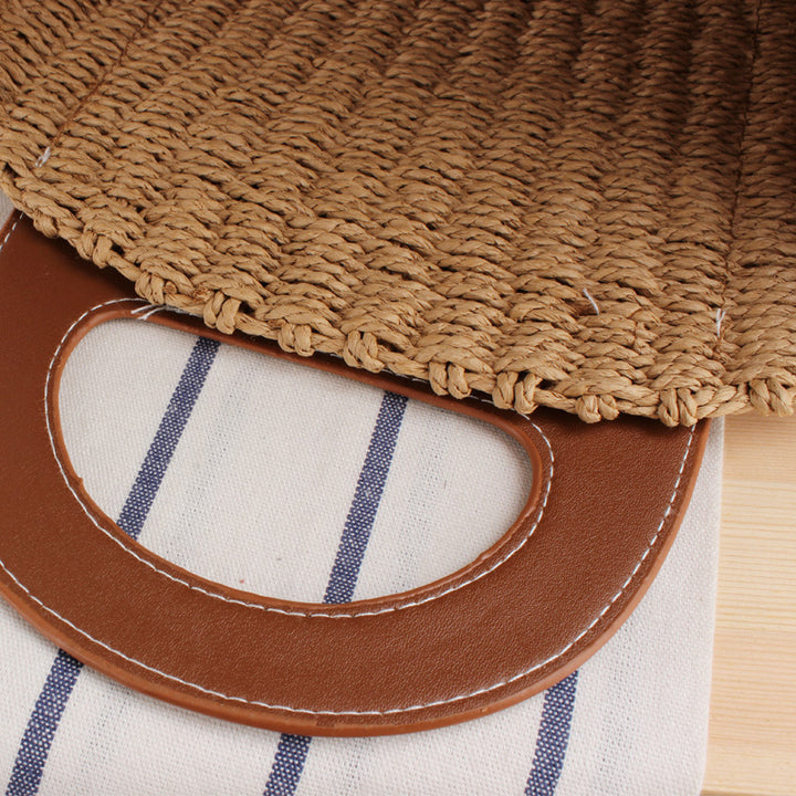 Natural raffia tote bag with elegant leather accents Bowlift