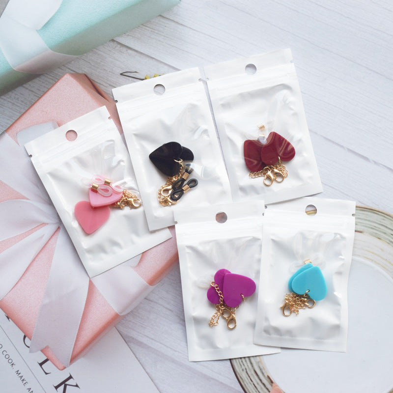 Heart-Shaped Dangle Earrings with Gold Chain Bowlift