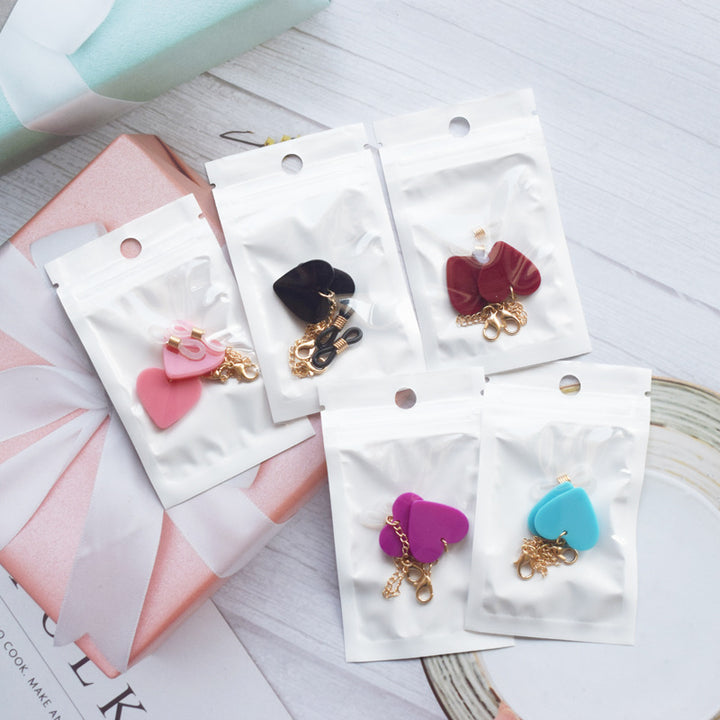Heart-Shaped Dangle Earrings with Gold Chain Bowlift