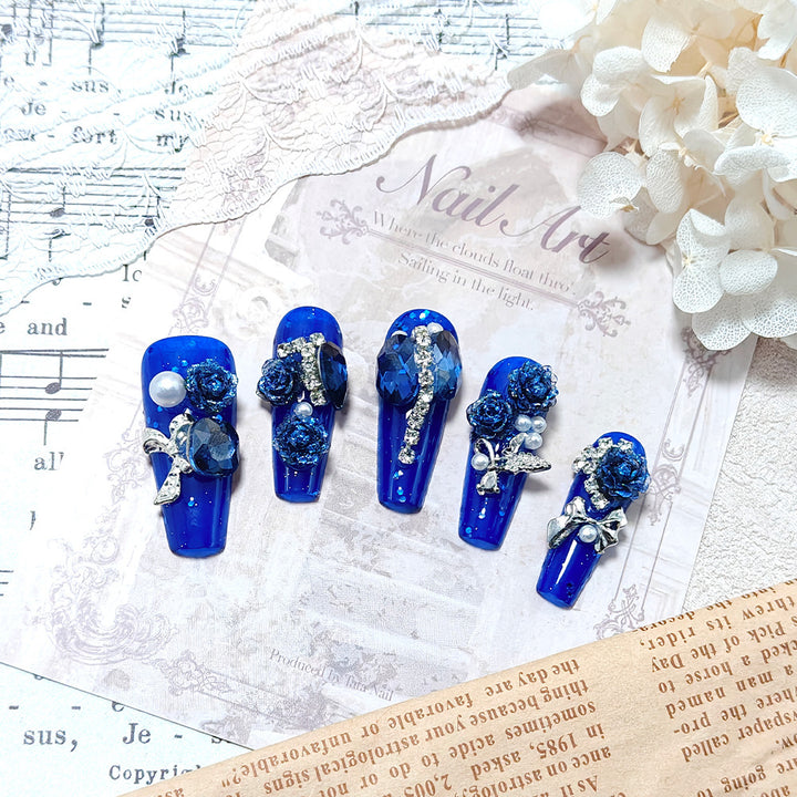 Glamorous artificial nails with floral decoration Bowlift