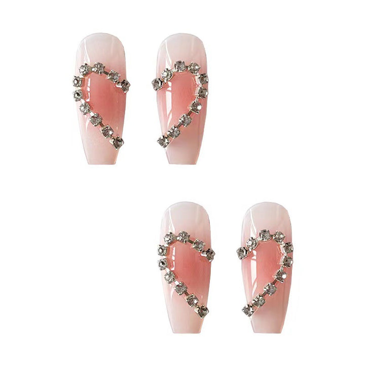 Artistic gel nails with heart accents Bowlift