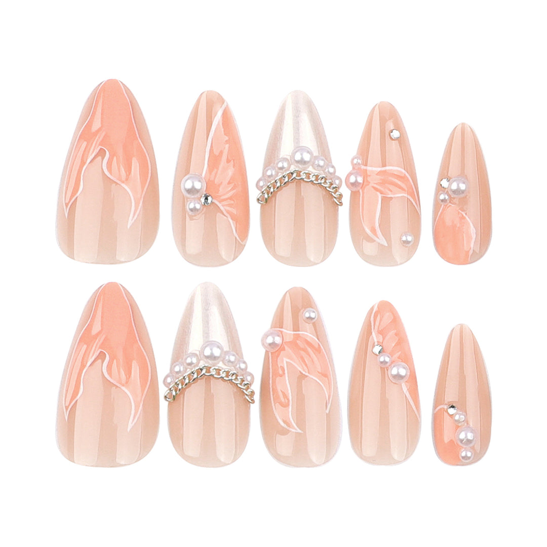 Artistic stiletto nails with pearl and flower embellishments Bowlift