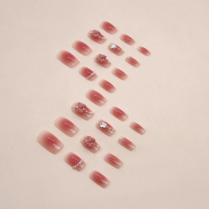 Artificial nails with perforated flower pattern Bowlift