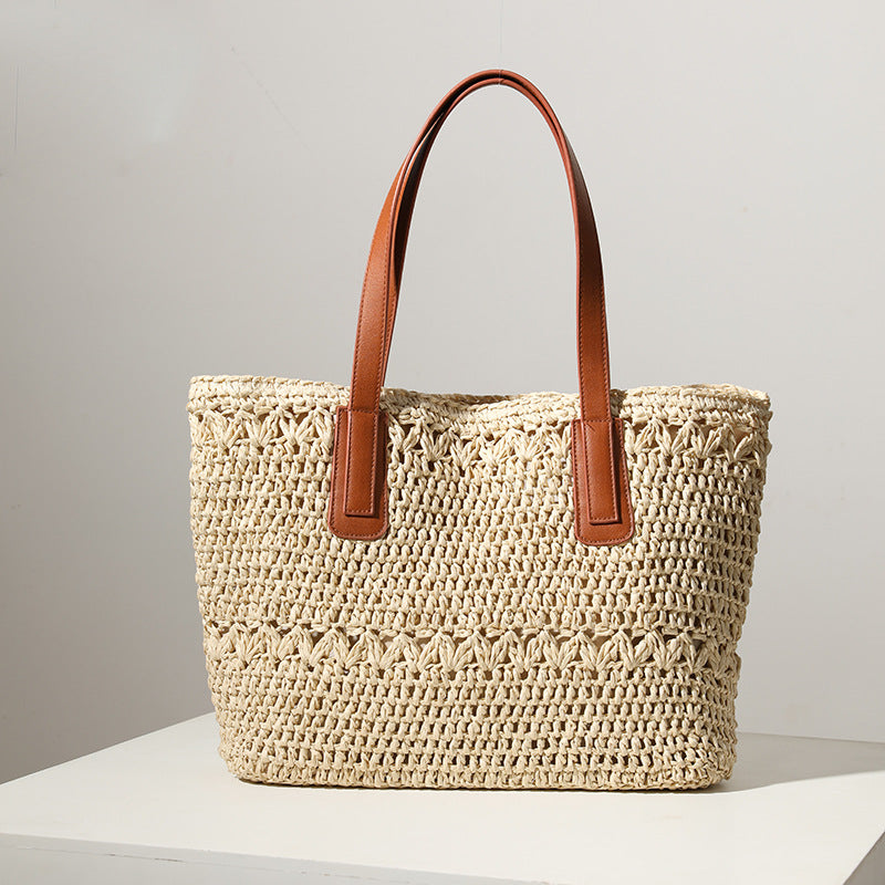 Braided straw bag with sturdy leather handles Bowlift
