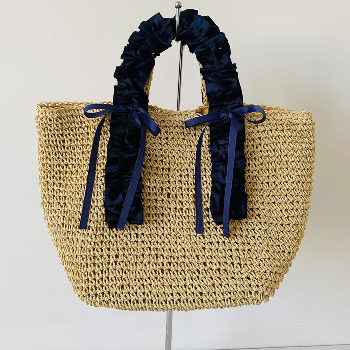 Crocheted beach bag with elegant satin accents Bowlift