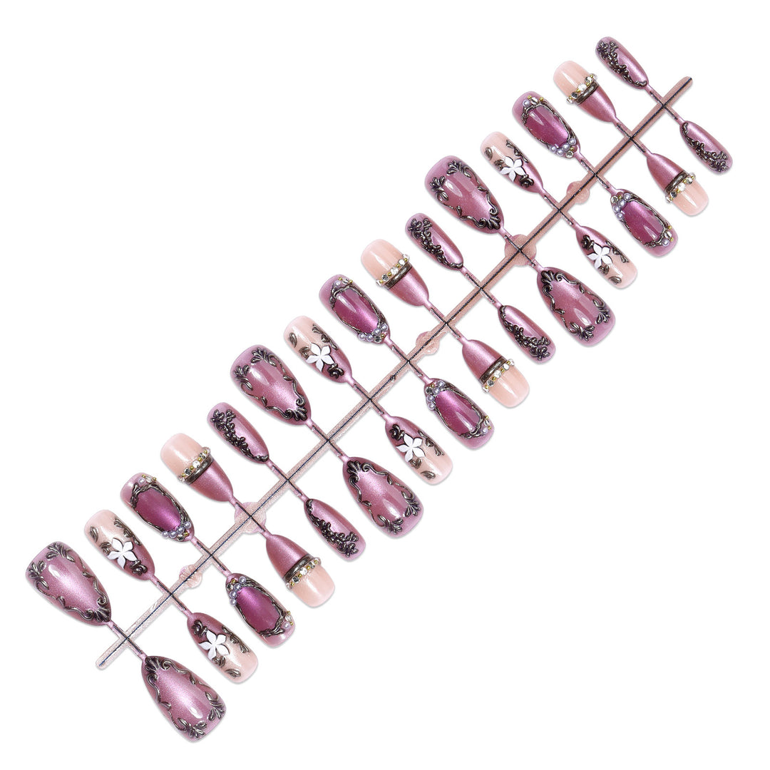 Acrylic nail set with floral design and glamorous accents Bowlift