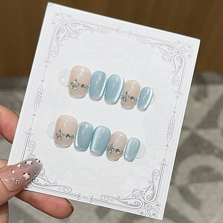 Elegant Artificial Nails with Radiant Accents Bowlift