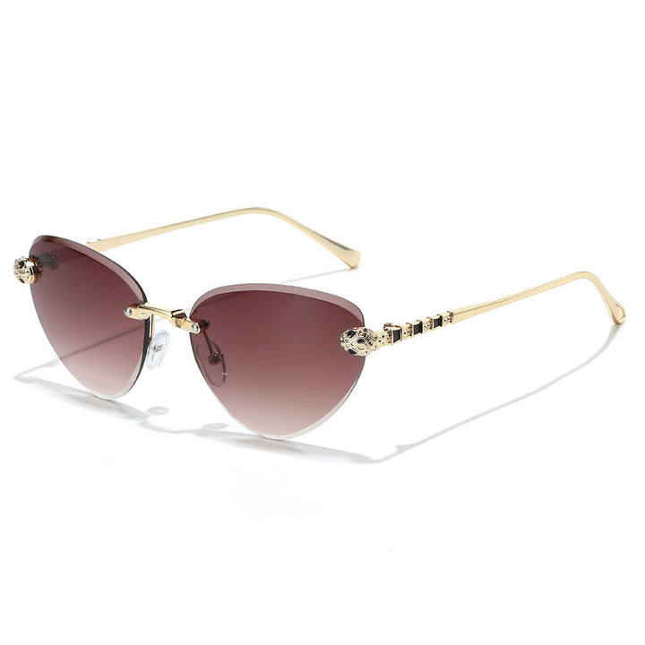 Designer Cat-Eye Sunglasses with Decorative Accents Bowlift