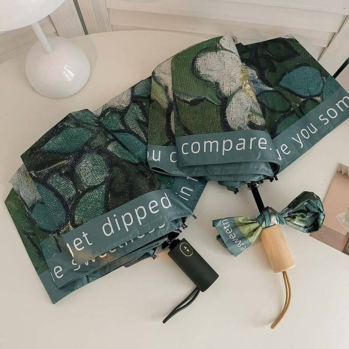 Women's Folding Umbrella with Botanical Design and Stable Handling Bowlift