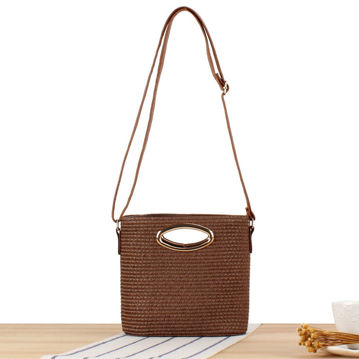 Shoulder bag made of handwoven natural material with elegant handle Bowlift