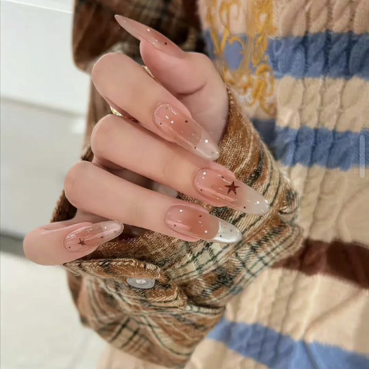 Long Stiletto Press-On Nails with Star Accent Bowlift