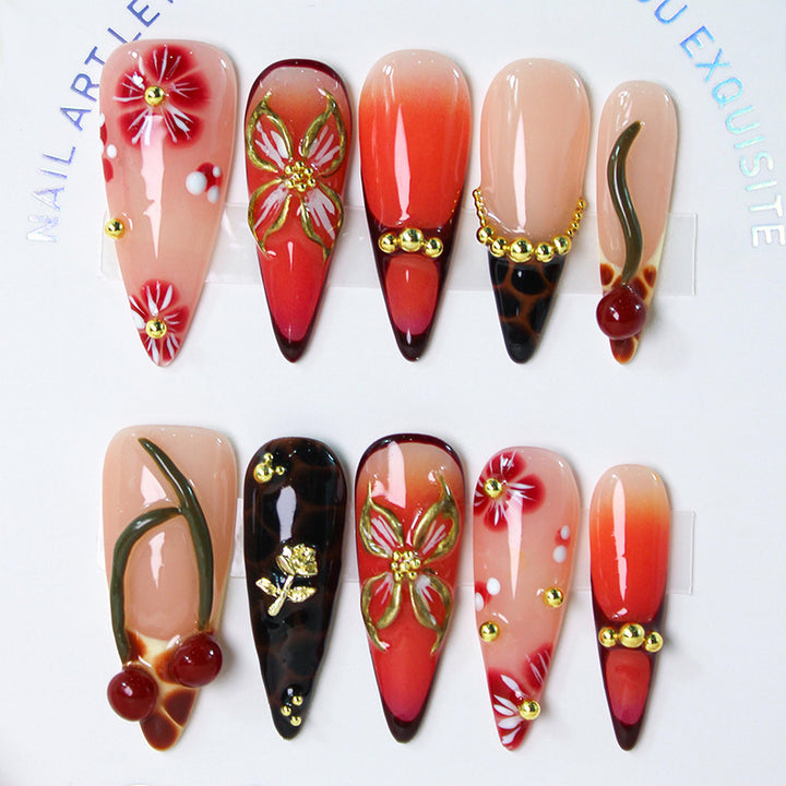 Artificial nail set with elegant floral decorations and modern accents Bowlift