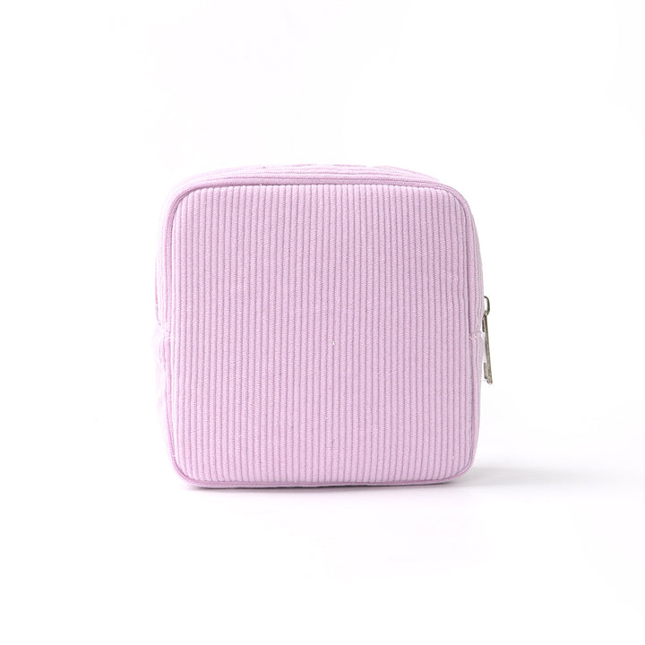 Cosmetic storage bag with structured surface Bowlift