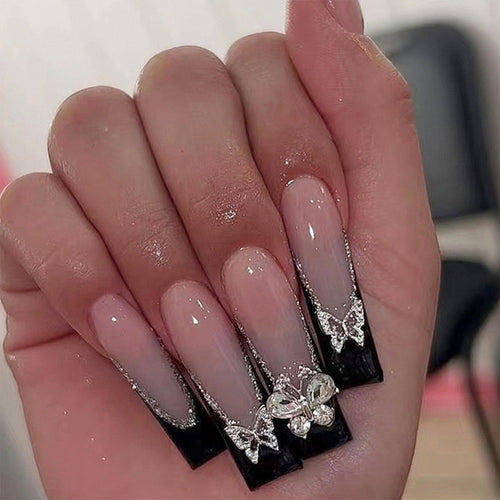 Glamorous artificial nails with rhinestone and butterfly elements Bowlift