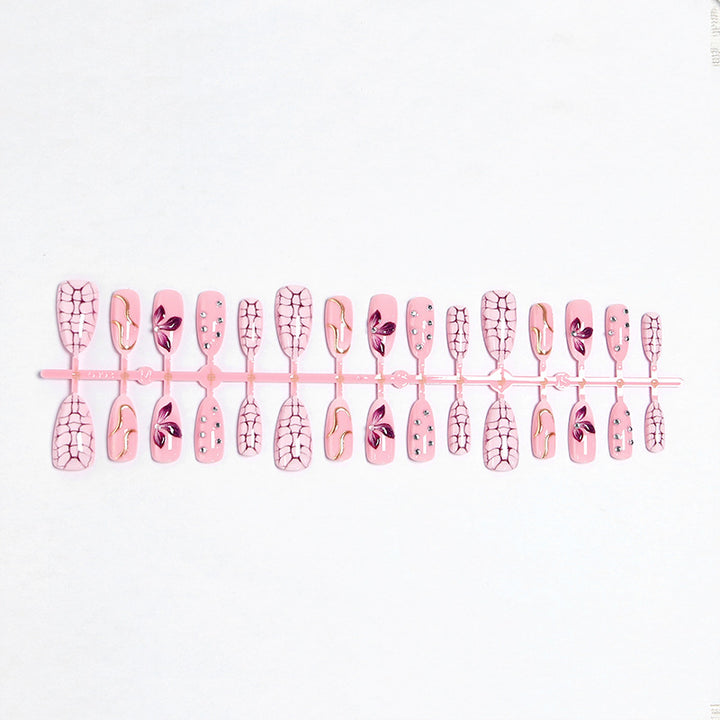 Acrylic nail set with glamorous design and sparkling accents Bowlift