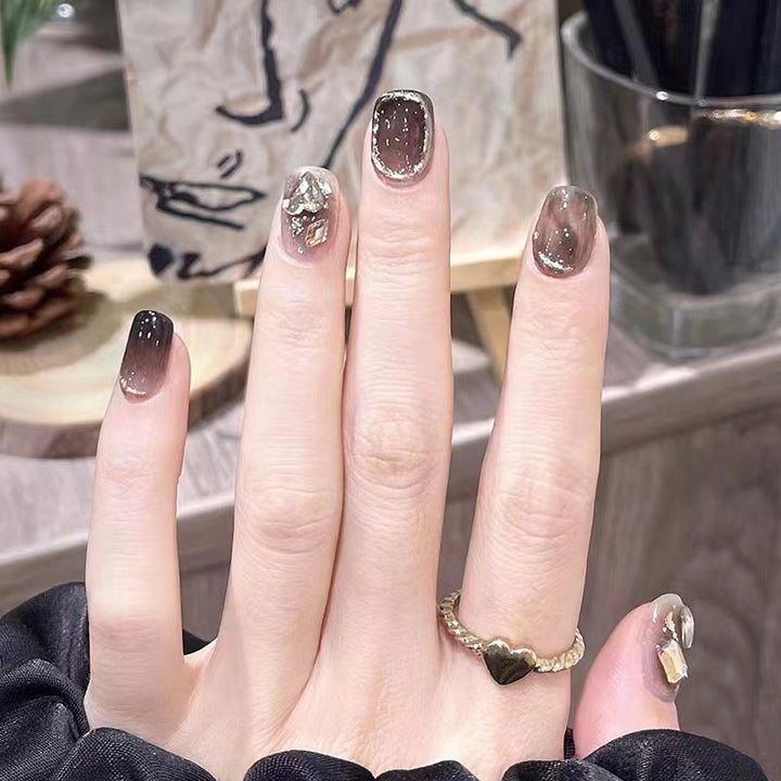 Glamorous nail art with crystal accents Bowlift