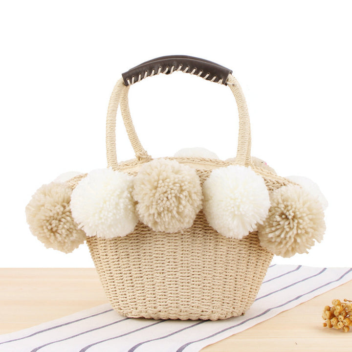 Basket bag with decorative pompons Bowlift