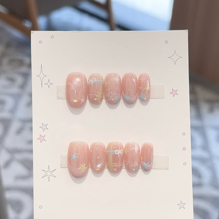 Artificial nails with romantic star and glitter motifs Bowlift