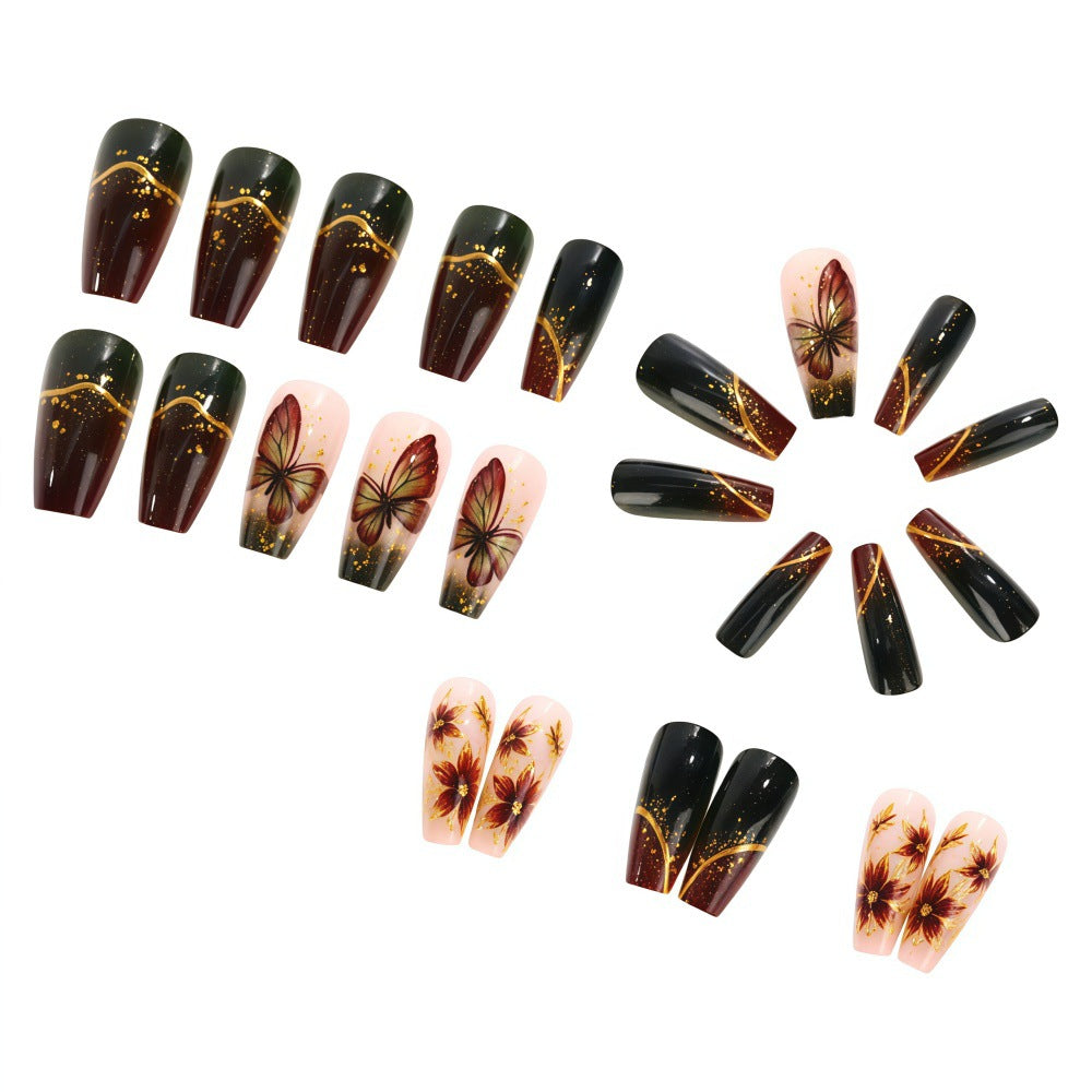 Artificial nails with elaborate butterfly and flower designs Bowlift