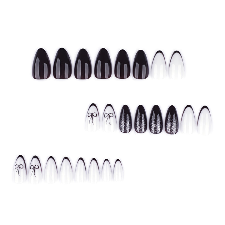 Artful nail art with elegant bow pattern and glitter accents Bowlift