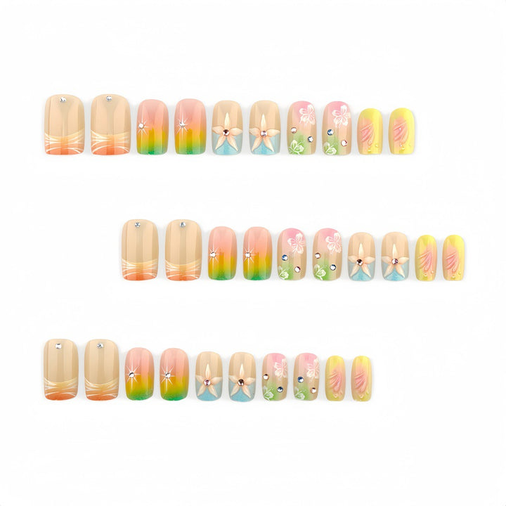 Acrylic nails with floral accents and gradient Bowlift