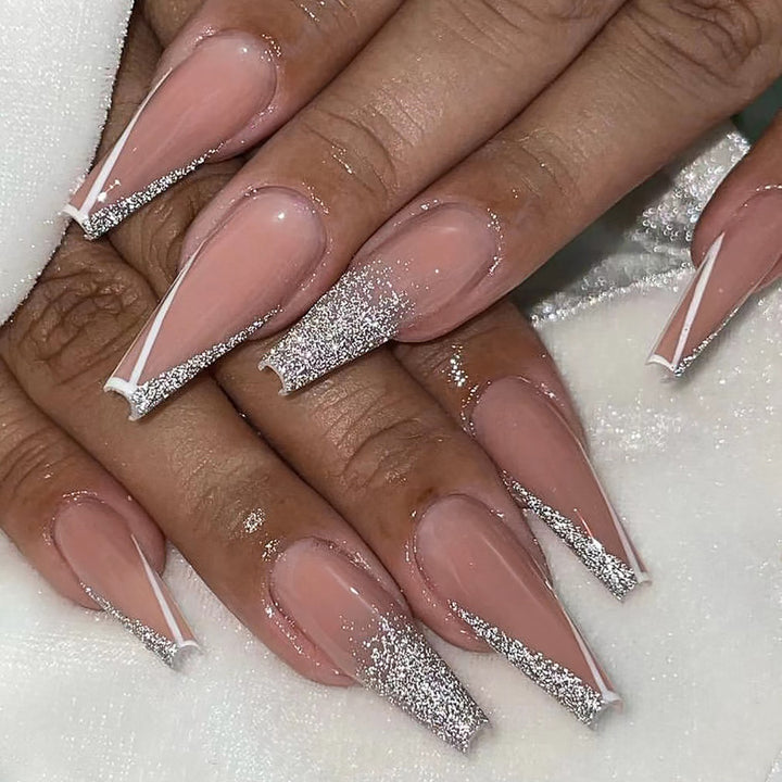 Artful stiletto nails with glitter and French tip Bowlift