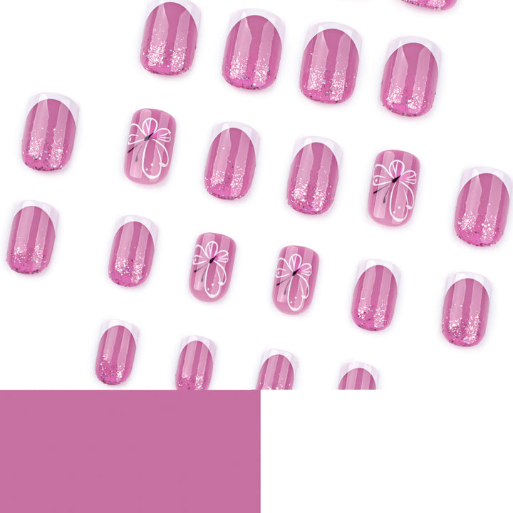 Artistic nail art with glitter and butterfly design Bowlift