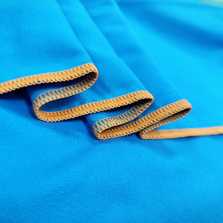 Hooded poncho with practical pockets and quick-drying material Bowlift