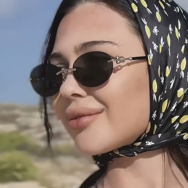 Women oval sunglasses with luxurious metal frame and mirrored lenses Bowlift