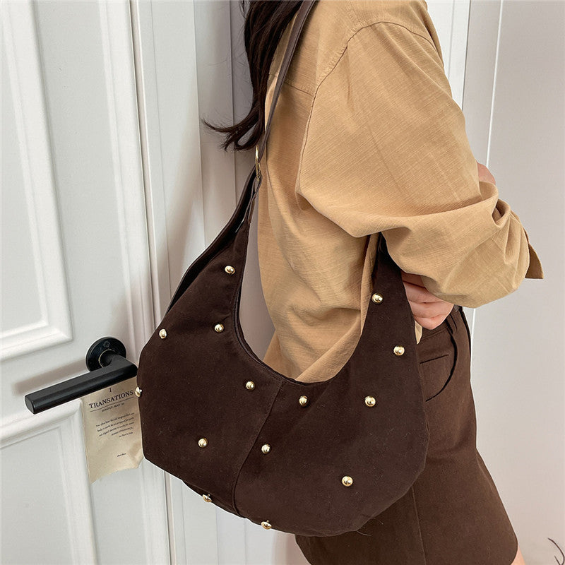 WoTextured Suede Hobo Bag with Decorative Studs Bowlift