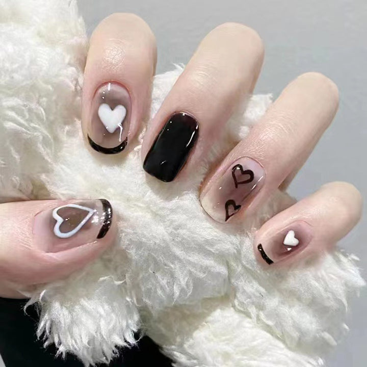 Artistic Press-On Nail Set with Heart and Graphic Design Bowlift