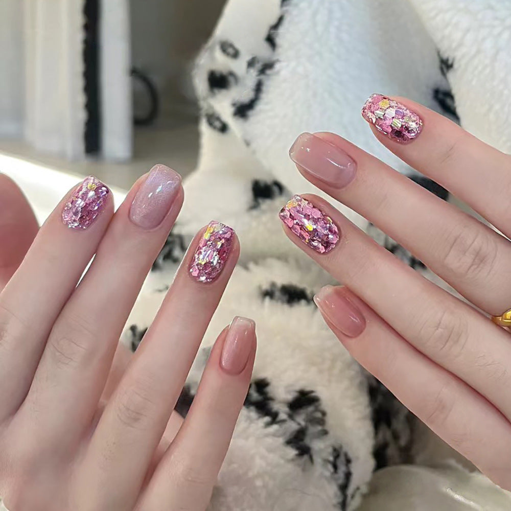 Artificial nail art with glitter and glamour effects Bowlift