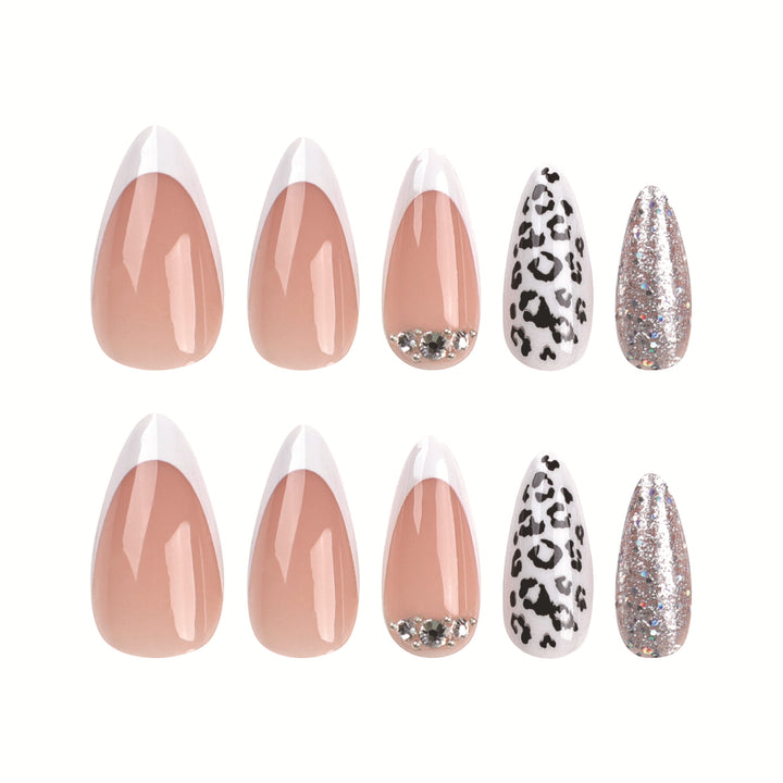 Artful stiletto nails with leopard patterns and glitter accents Bowlift