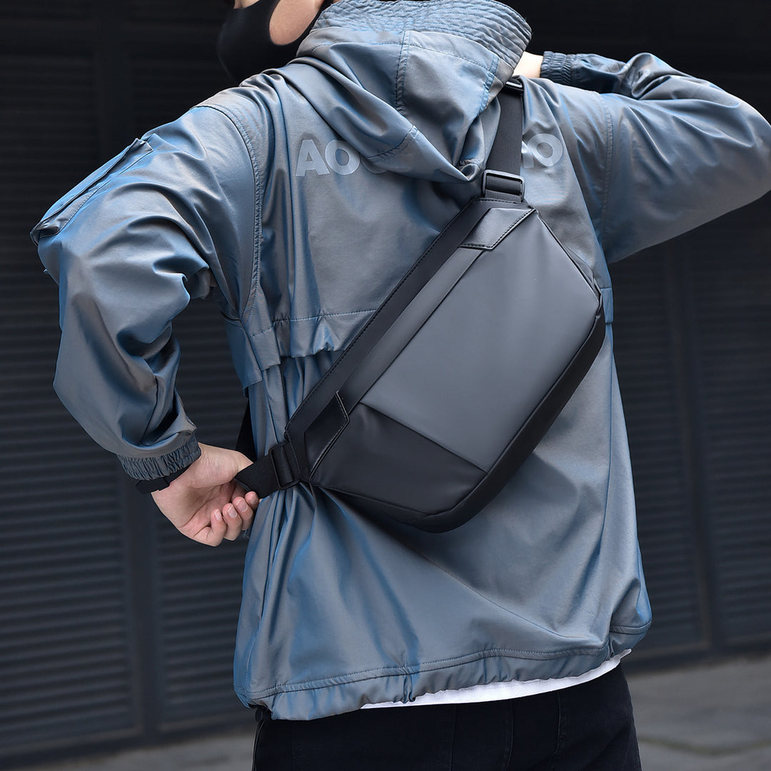 Practical shoulder bag made of waterproof material with an adjustable carrying strap Bowlift