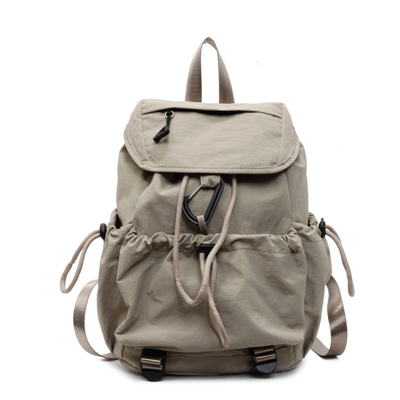 Leisure backpack with elastic drawstring and practical side pockets Bowlift