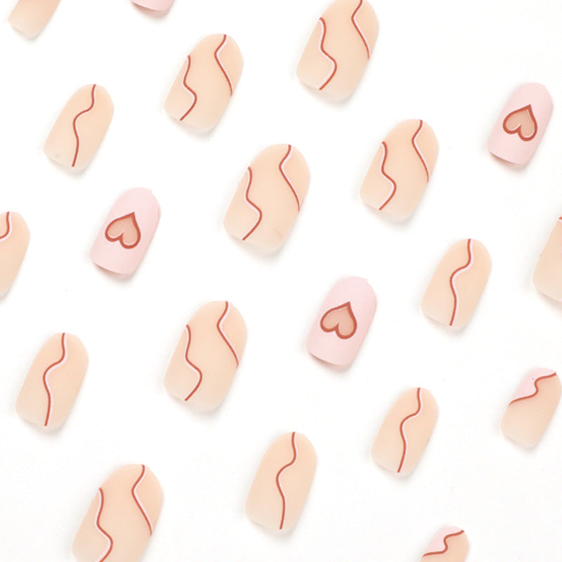 Artful Nail Extensions with Elegant Heart Design Bowlift