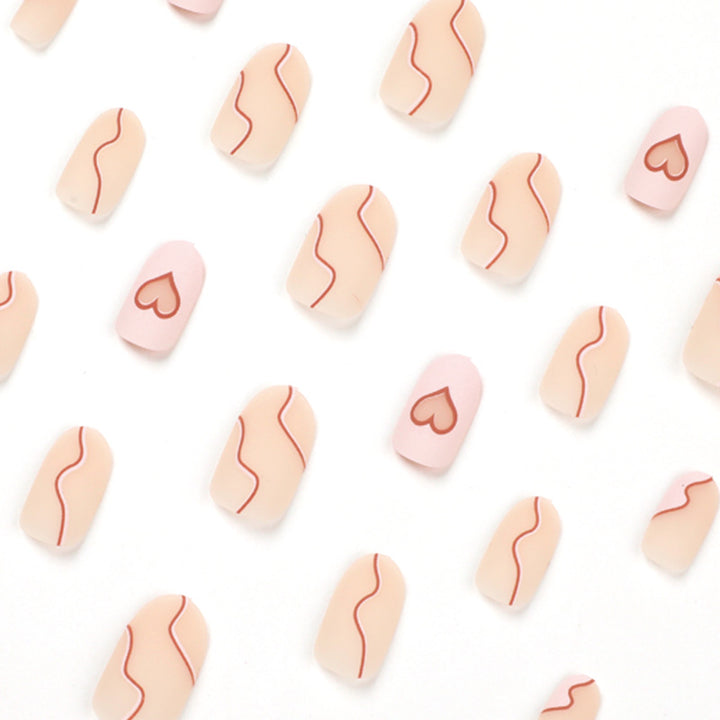 Artful Nail Extensions with Elegant Heart Design Bowlift