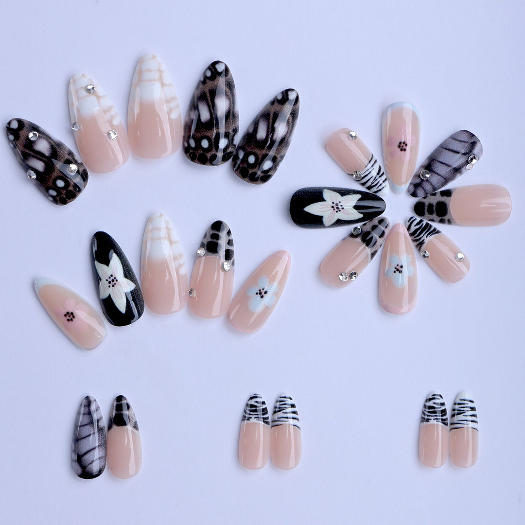 Nail art with elegant designs and embellishments Bowlift