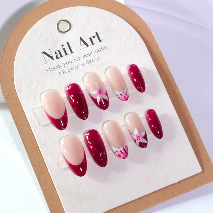 Artistic nail art with floral accents and glossy finish Bowlift