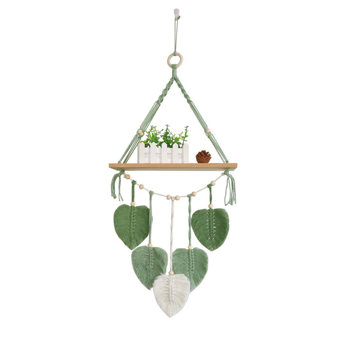 Macramé plant shelf with artistic leaf design
