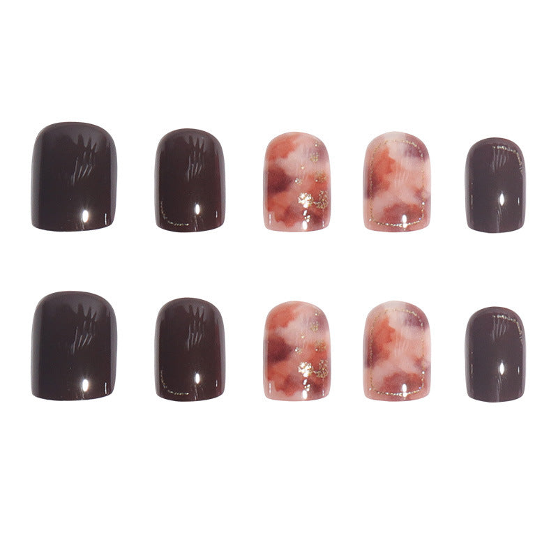 Artistic Press-On Nail Set with Marble and Metallic Accents Bowlift