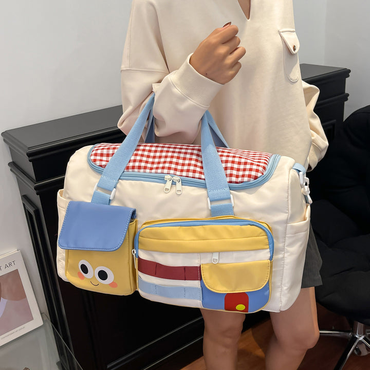 Sporty travel bag with multiple outer pockets Bowlift