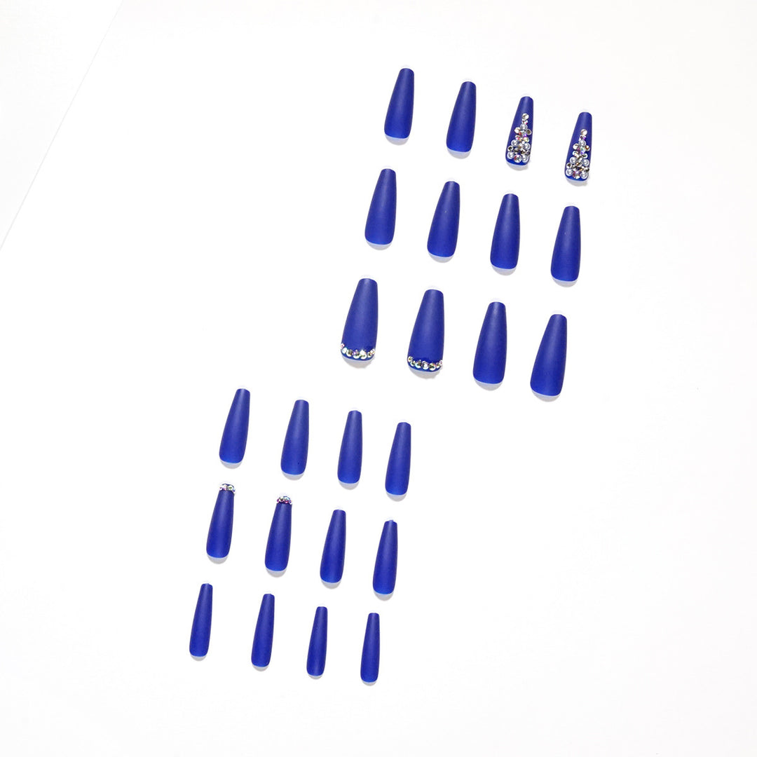 Nail extensions with elegant rhinestone embellishments Bowlift