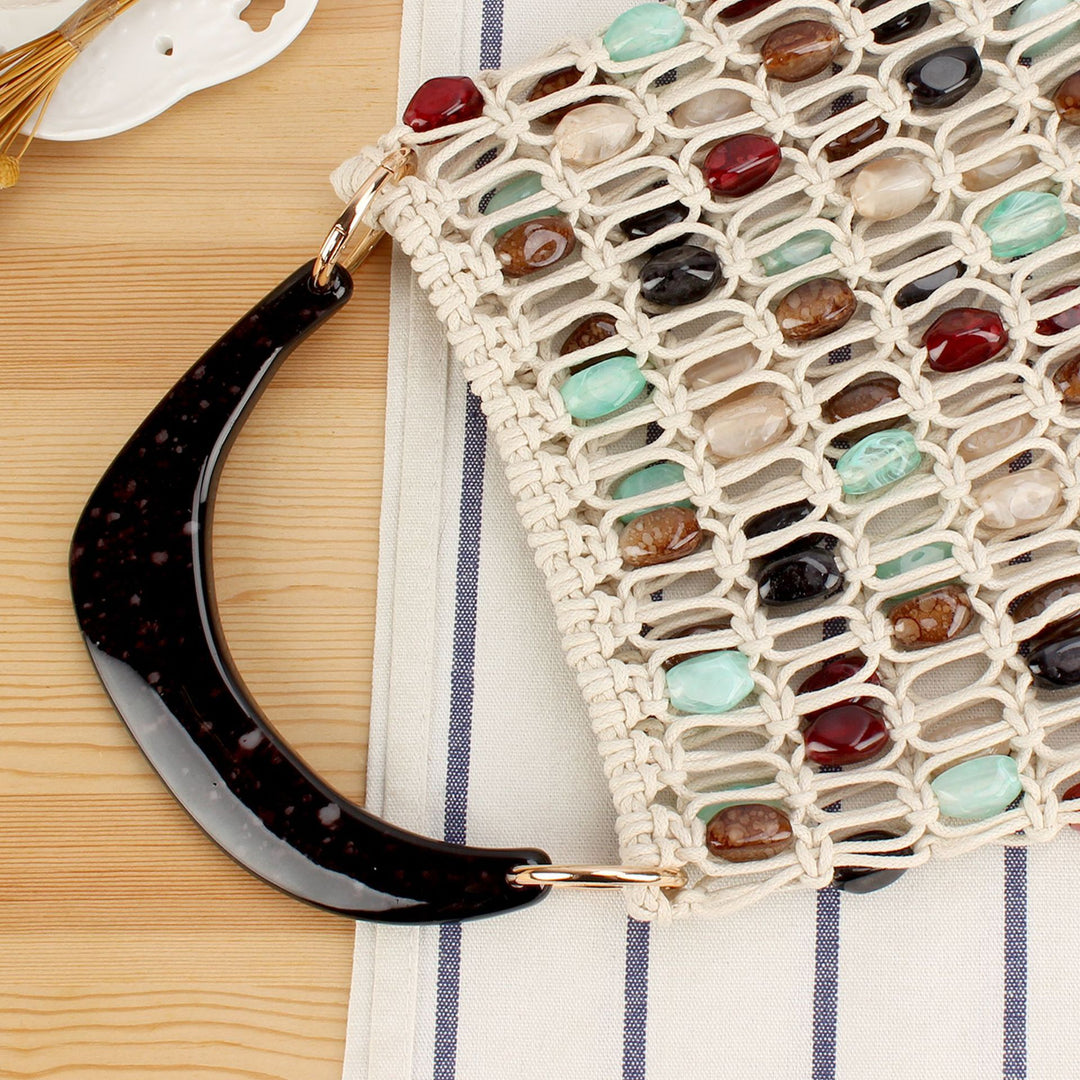 Fashionable handbag in creative net design with colorful accents Bowlift