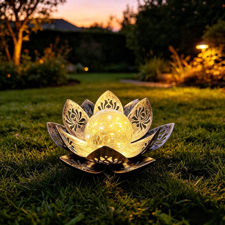 Decorative lotus solar garden light with antique metal petals and cracked glass globe Bowlift