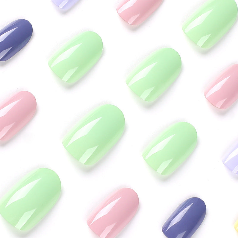 Artistic Nail Art with Soft Colors and High Gloss Finish Bowlift