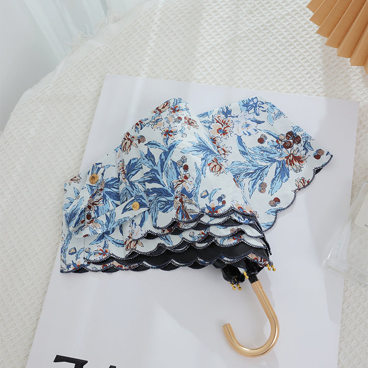 Women's elegant automatic folding umbrella with floral details Bowlift