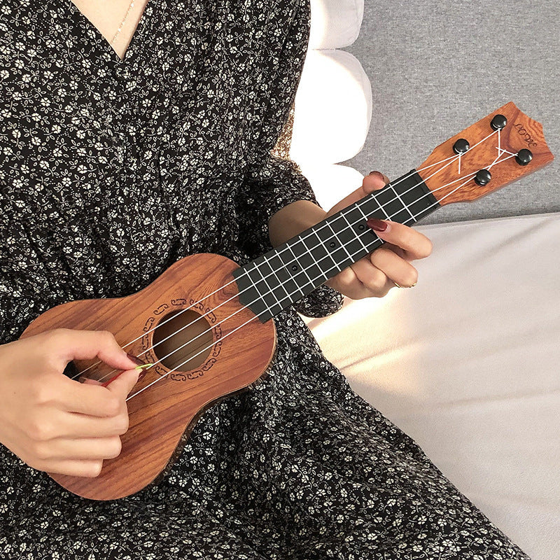 Mini Acoustic Ukulele Bowlift